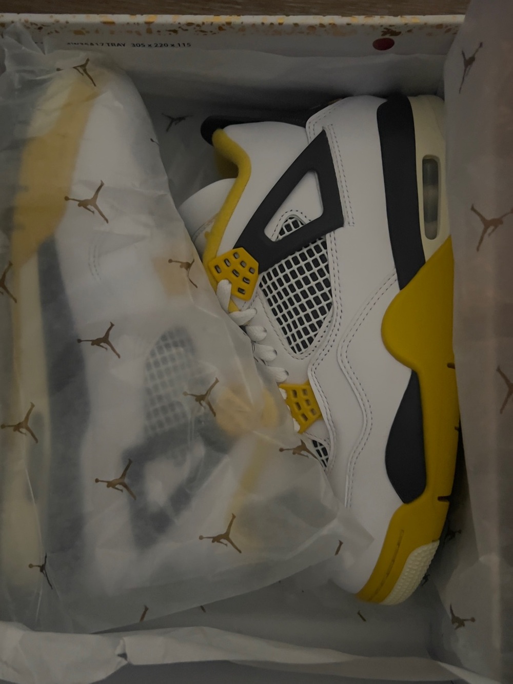 Jordan White, Yellow & Black Retro 4 Sneakers